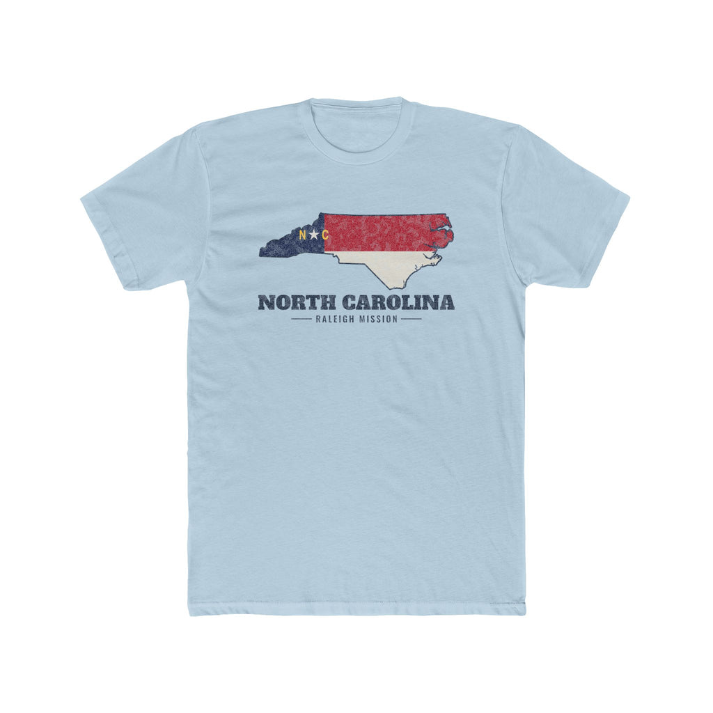 North Carolina Raleigh Mission Flag Map shirt in Desert Pink: North Carolina state flag in the outline of North Carolina with navy lettering, front view