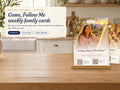Come, Follow Me 2027 family card on a wooden stand on a kitchen counter